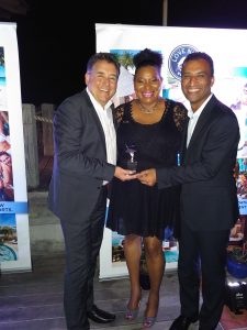 Flemming Friisdahl accepting the Top Growing Agency in Canada award from the team at Sandals